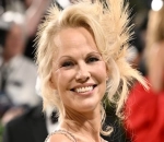 Pamela Anderson Exudes Old Glamor on Her Met Gala Debut
