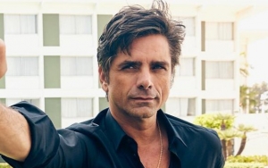 John Stamos Vows to Avoid Sharing Son's Photos After Being 'Dad-Shamed'