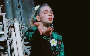 Grimes Tests Positive for Covid-19, Says She 'Weirdly' Enjoys It
