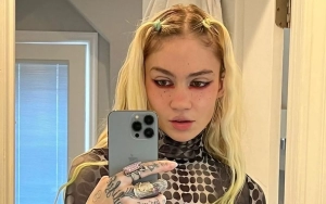 Grimes Thinks Elon Musk and Mark Zuckerberg Cage Fight Is 'Good' Outlet for 'Trad Masculinity'