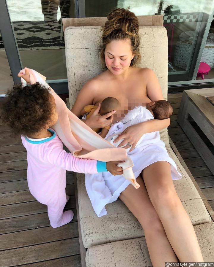 Chrissy Teigen Breastfeeding Picture