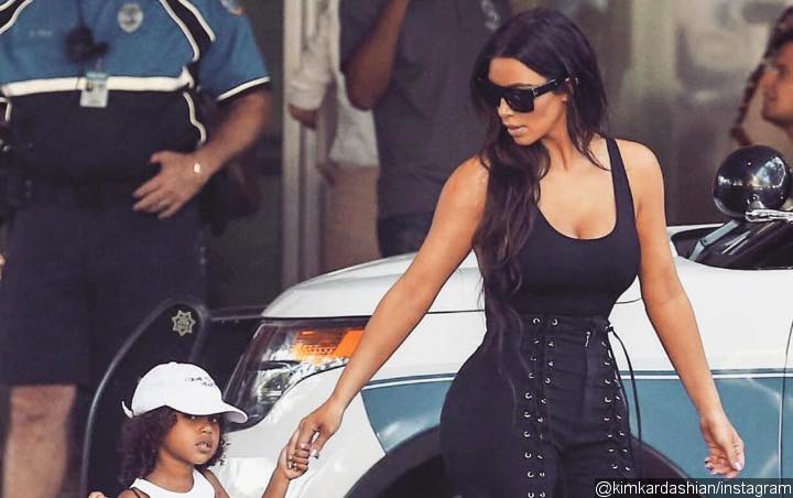 North West Seen Crying While Leaving Bowling Alley With Kim Kardashian