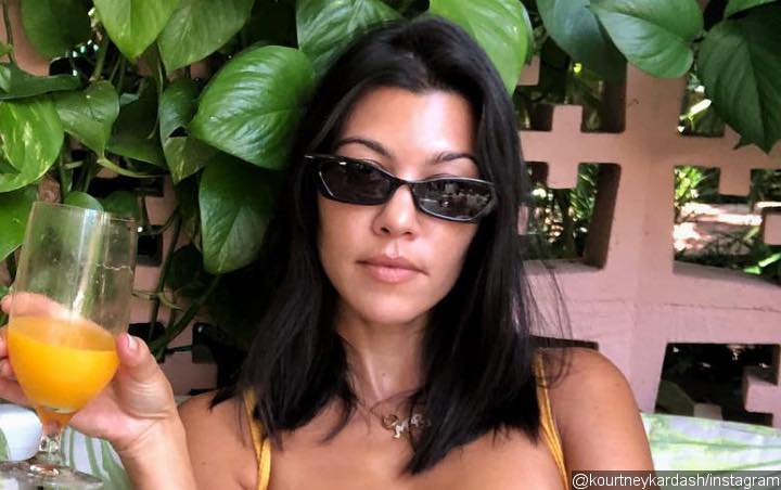 Kourtney Kardashian Hits the Beach With Her Kids and Mystery Guy After Younes Bendjima Split