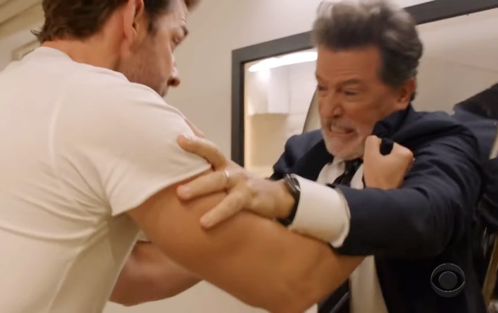 John Krasinski Beats Stephen Colbert Up in 'Late Show' Sketch