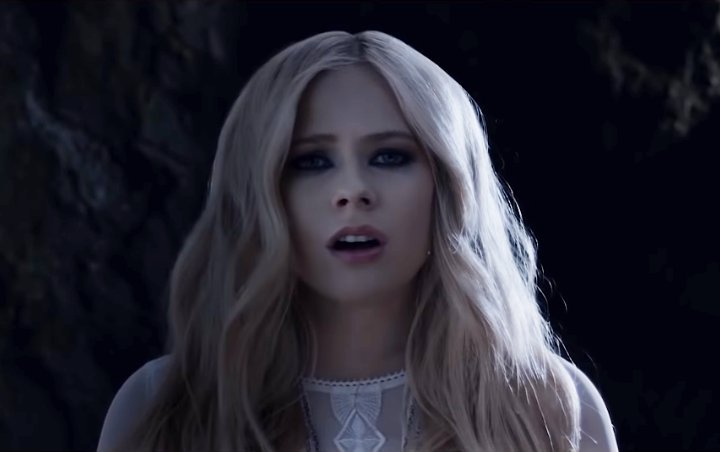 Avril Lavigne Gets Haunting in 'Head Above Water' Music Video