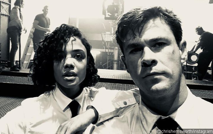 Chris Hemsworth and Tessa Thompson Brave the Heat in New 'Men in Black' Spin-Off Pic