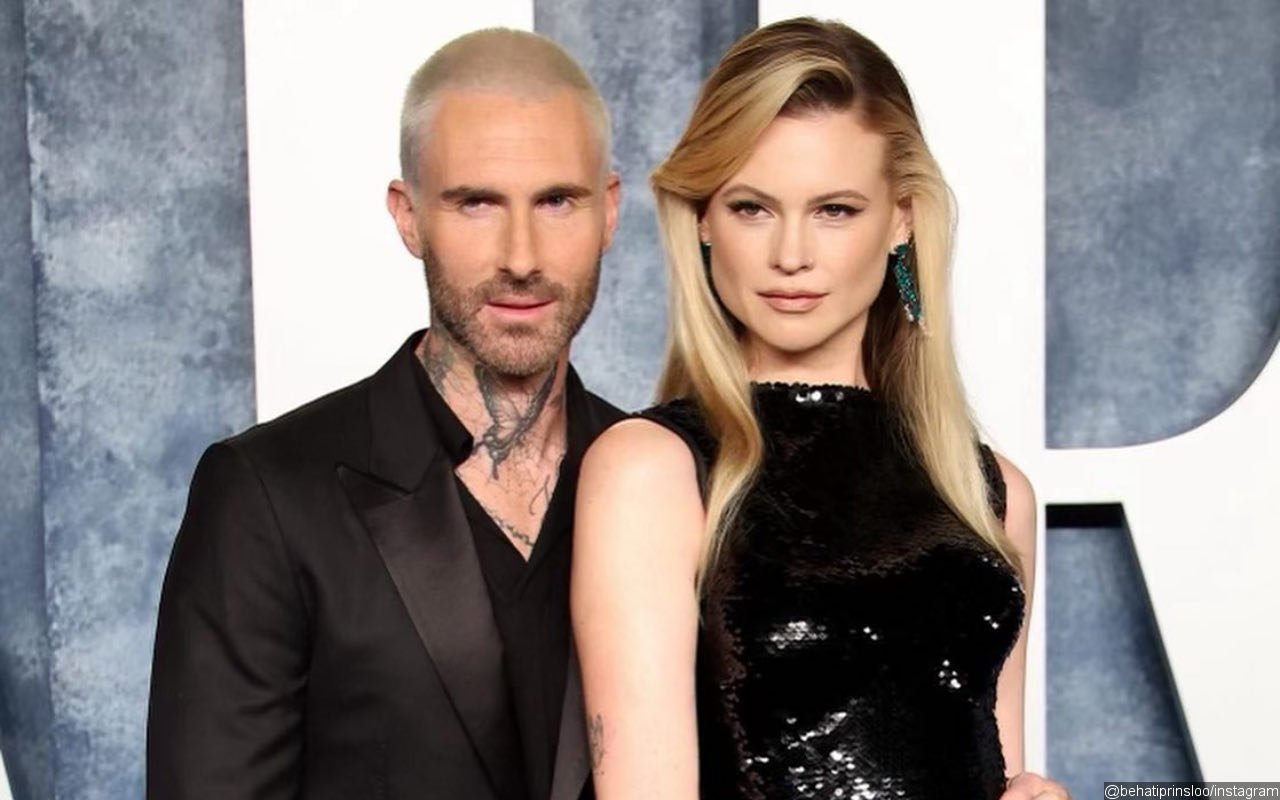 Behati Prinsloo Showers Adam Levine With Kisses at Disneyland on His Birthday After Sexting Scandal