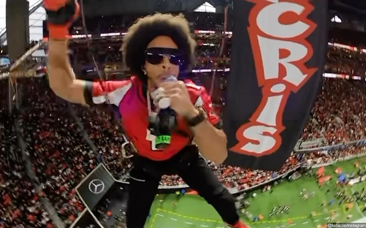 Ludacris Rappels Down the Top of Mercedes-Benz Stadium During Performance at Falcons Game