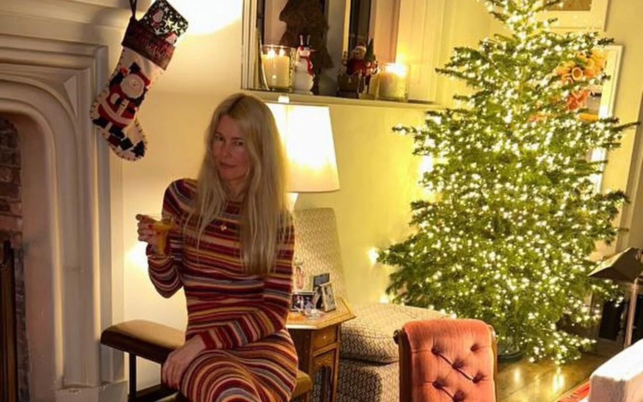 Claudia Schiffer Hanging Out Versace Stocking for Christmas