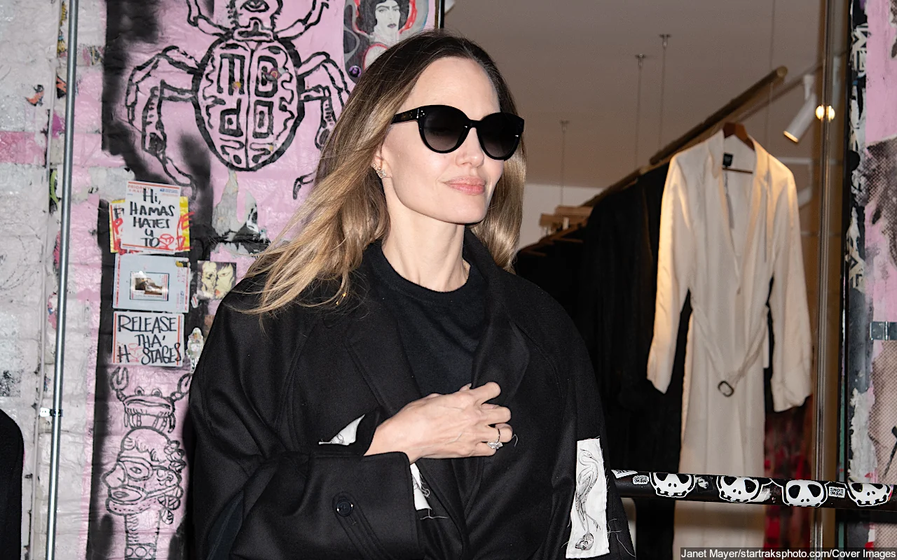 Angelina Jolie Debuts New Hair in Rare Public Sighting With Son Pax