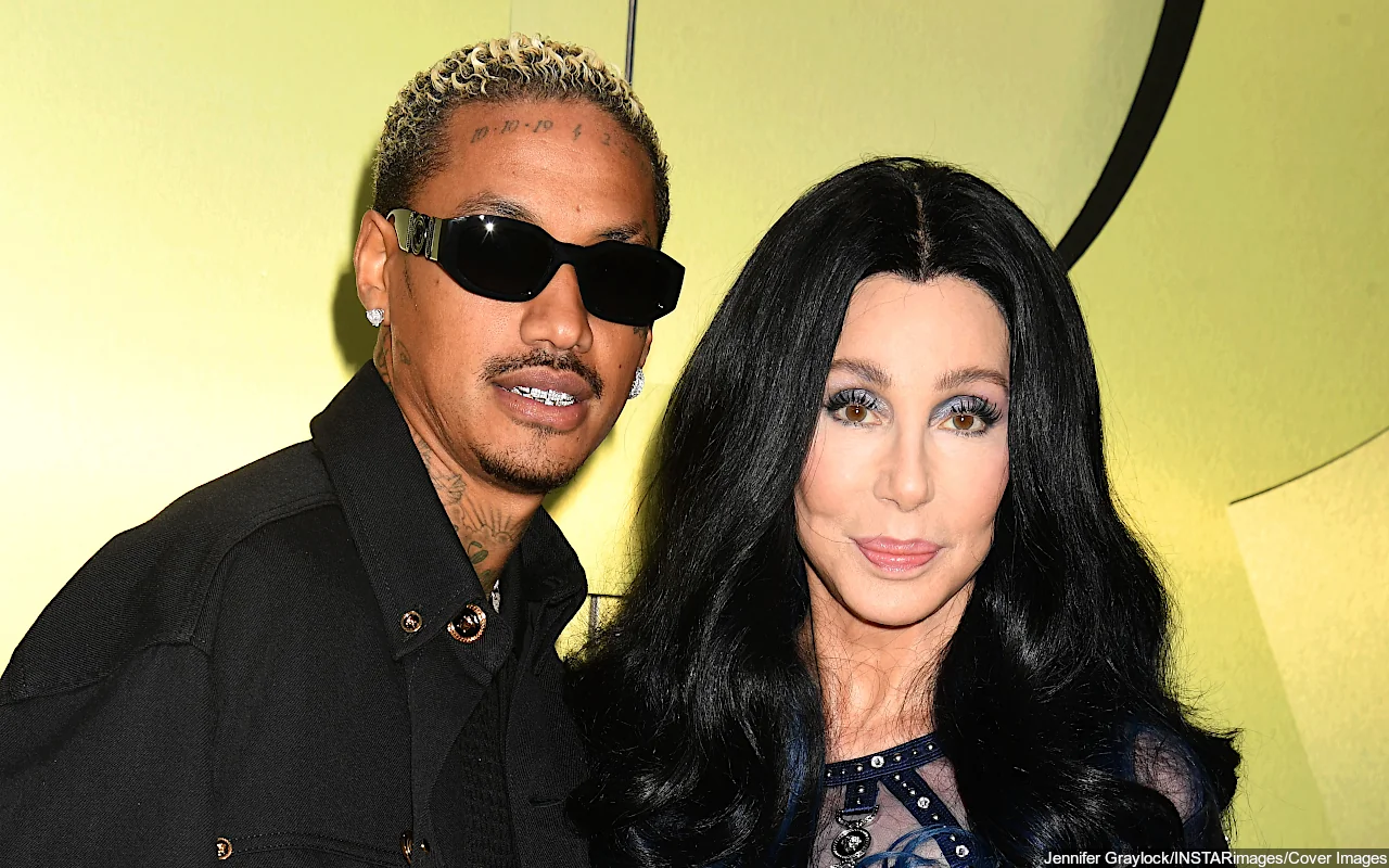 Cher Cozies Up to Boyfriend A.E. During Rare Appearance at Paris Fashion Week