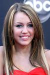 Miley Cyrus Gets Herself Fake Tan