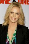 Charlize Theron Kisses Female Fan for 140,000 Dollars