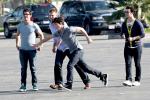 Photos: Jonas Brothers Play Football During Break