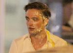 Robert Pattinson Gets Pie on Face on 'Cosmopolis' Set
