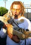 Dreadlocked Bradley Cooper Gets Cuddly With Tiger Cub