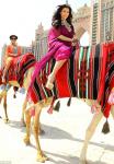 Kim Kardashian Keeps Stilettos On During Camel Ride in Dubai
