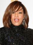 Whitney Houston Nearly Being Kicked Off a Flight for Refusing to Buckle Up
