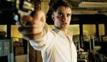 Angry Robert Pattinson Aims His Gun in New 'Cosmopolis' Stills