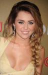 Miley Cyrus Responds to Boob Job Rumors, Insisting Hers Are Real