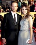 Troian Bellisario and Patrick J. Adams Confirm They're Dating