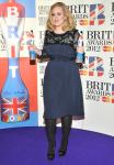 Adele Wins Big at 2012 BRIT Awards, Flips the Bird on Stage