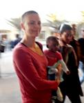 Charlize Theron Debuts Shaved Head in Namibia