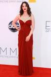 Kat Dennings Slouches on Emmys' Red Carpet to Avoid Wardrobe Malfunction