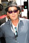 Charlie Sheen Aids Lindsay Lohan in Her Tax Bill