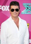 Simon Cowell Is Victim of 911 Prank Caller Claiming Someone Held Hostage in His House