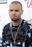 Chris Brown Gives Sneakers to Children in Los Angeles