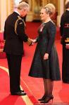 Adele Receives MBE Honor From Prince Charles