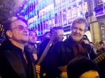 Video: Bono and Glen Hansard Sing Christmas Songs on Dublin Street for Charity