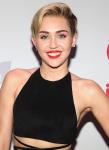 Miley Cyrus Catches Up on Her Reading While in Hospital