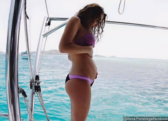 Alexa PenaVega Debuts Her Baby Bump in Bikini, Calls It 'Little Nugget'