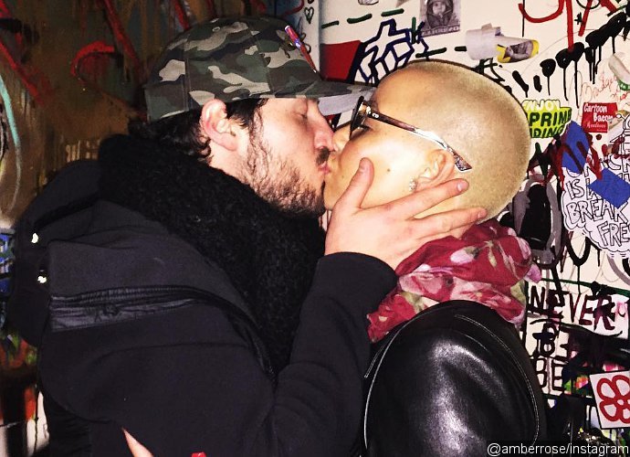 Amber Rose and Her 'Love' Val Chmerkovskiy Share Smooch in This PDA Pic