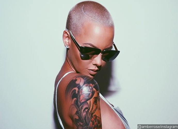 Amber Rose Flaunts Major Sideboob and Butt in Tiny Bodysuit