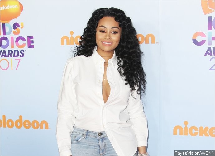 Blac Chyna Flaunts Impressive Post-Baby Abs as She Steps Out With Mystery Guy