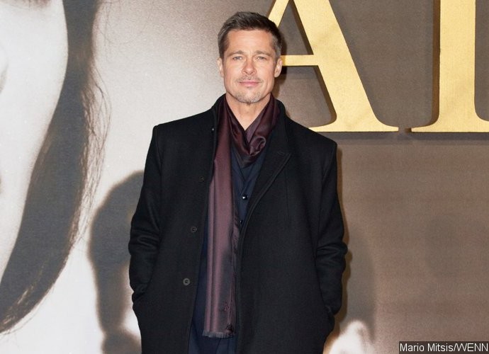 Brad Pitt Flashes a Glimpse of New Motorcycle Tattoo on His Arm