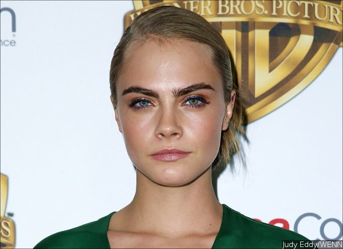 Cara Delevingne Infuriates Animal Lovers With Her Dog's 'Pepper Spray' Collar