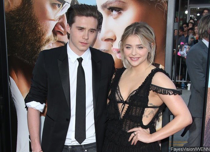 Chloe Moretz Straddles Brooklyn Beckham While He's 'Keeping Her Safe' in This Sweet Pic