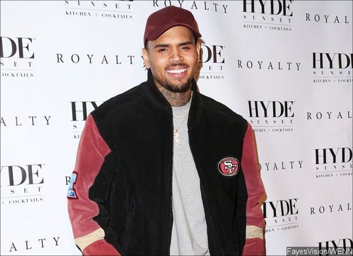 Chris Brown Reacts to Accusations That He Pulled Gun on Woman