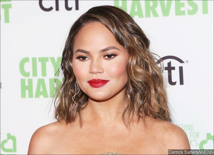 Chrissy Teigen Jokes About Getting Extensive Plastic Surgery: Everything Is Fake Except My Cheeks