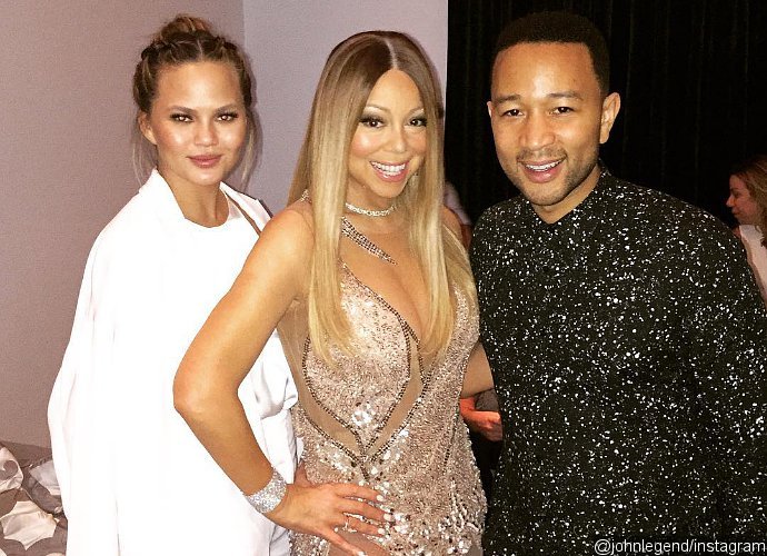 Chrissy Teigen Screams Out Loud When Mariah Carey Takes John Legend on Stage at Her Concert
