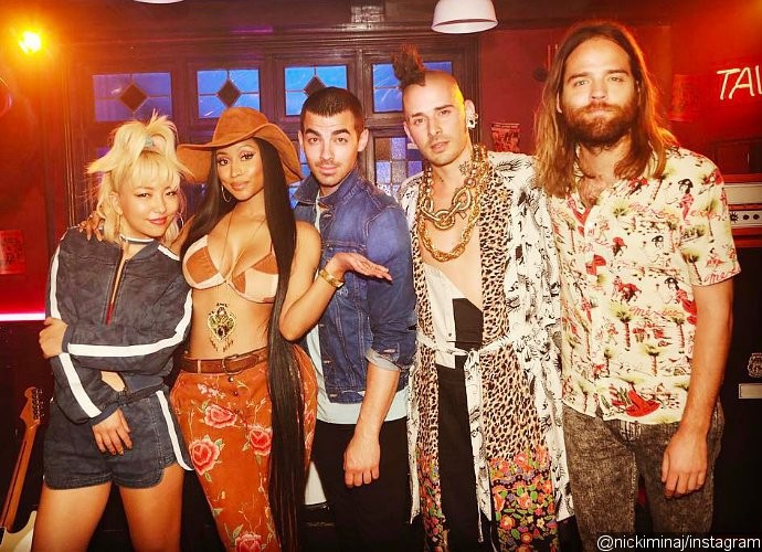 DNCE Recruits Nicki Minaj for New Single 'Kissing Strangers' - Watch the Snippet