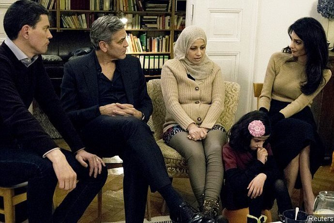 George Clooney and His Wife Amal Meet Syrian Refugees After Angela Merkel Meeting
