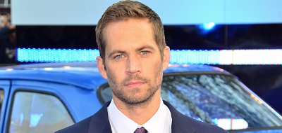  Paul Walker's car hit a light pole and tree before it was engulfed in flames 
