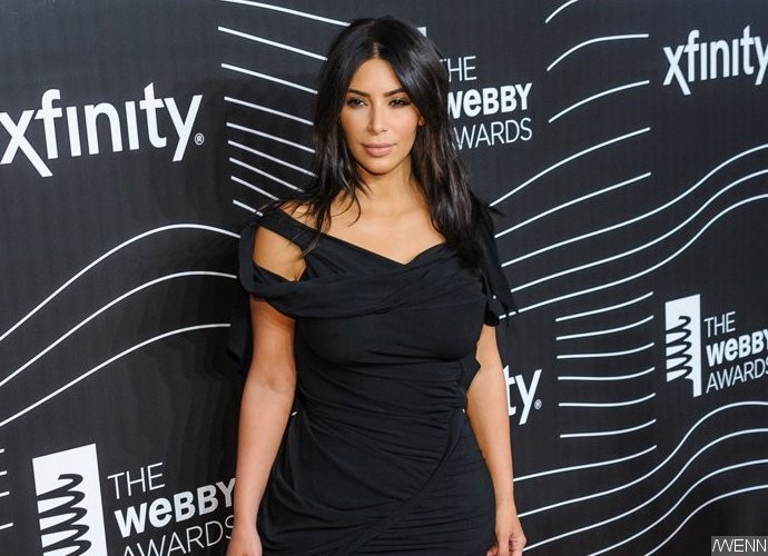 Unfazed by Kimoji Controversy, Kim Kardashian Sports Racy Dress Featuring Virgin Mary Image