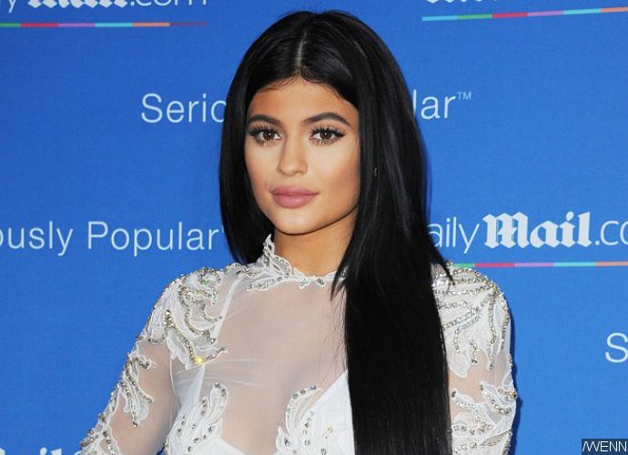 Kylie Jenner Flaunts Famous Derriere in Racy Fishnet Tights