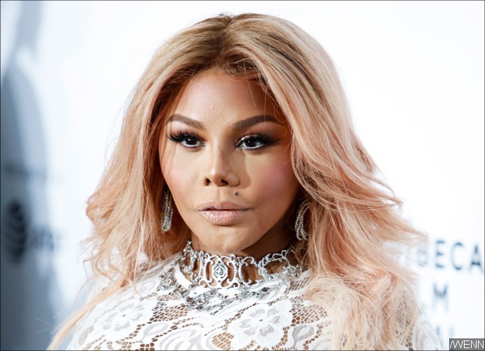 Lil' Kim Shows New Face After a Series of Plastic Surgeries. Going Too Far?
